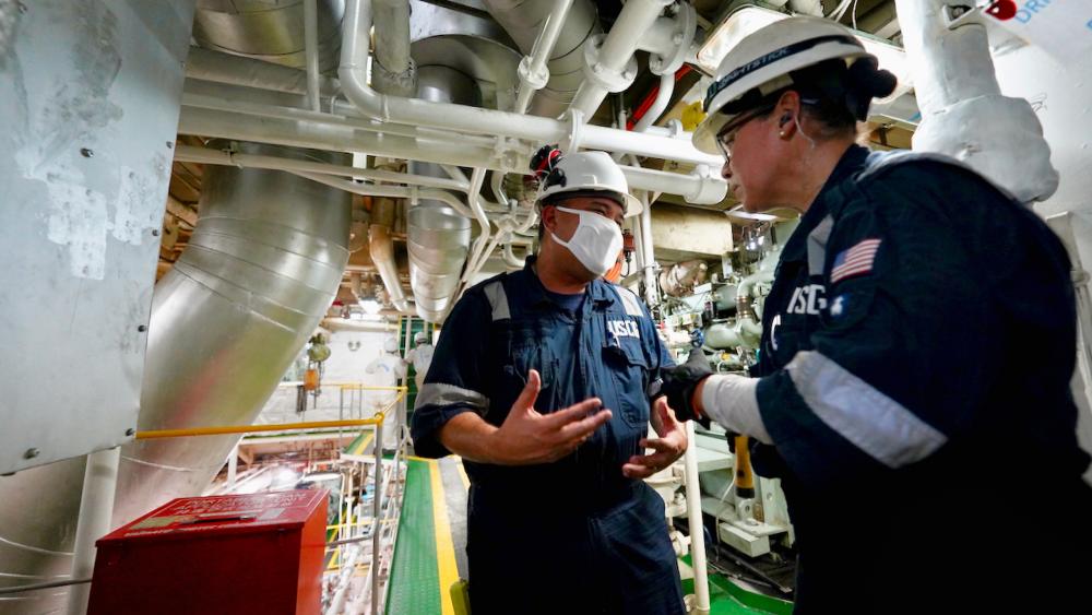 CGFM/SG marine inspectors discuss drills aboard the MV Kenyo