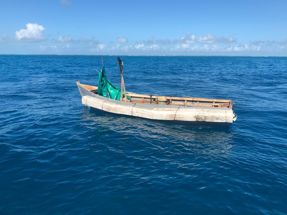 A Customs and Border Protection Air and Marine Operations law enforcement aircrew alerted Sector Key West watchstanders of this rustic sailing vessel about 20 miles south of Plantation Key, Florida, Oct. 31, 2022. The Cubans were repatriated to Cuba on Nov. 4, 2022. (U.S. Coast Guard photo)