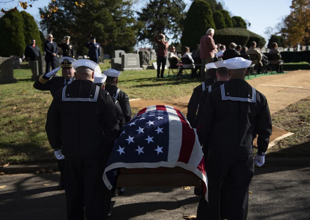 Funeral Honors detail carries the casket carrying the remains of Radioman 3rd Class Charles Montgomery