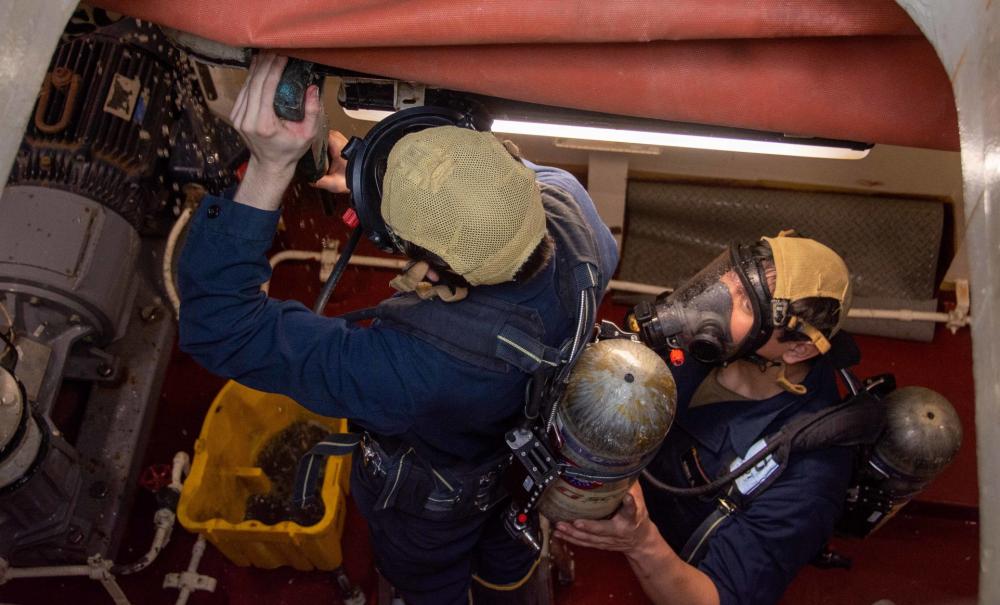 USS Ronald Reagan (CVN 76) Sailors repair CHT system