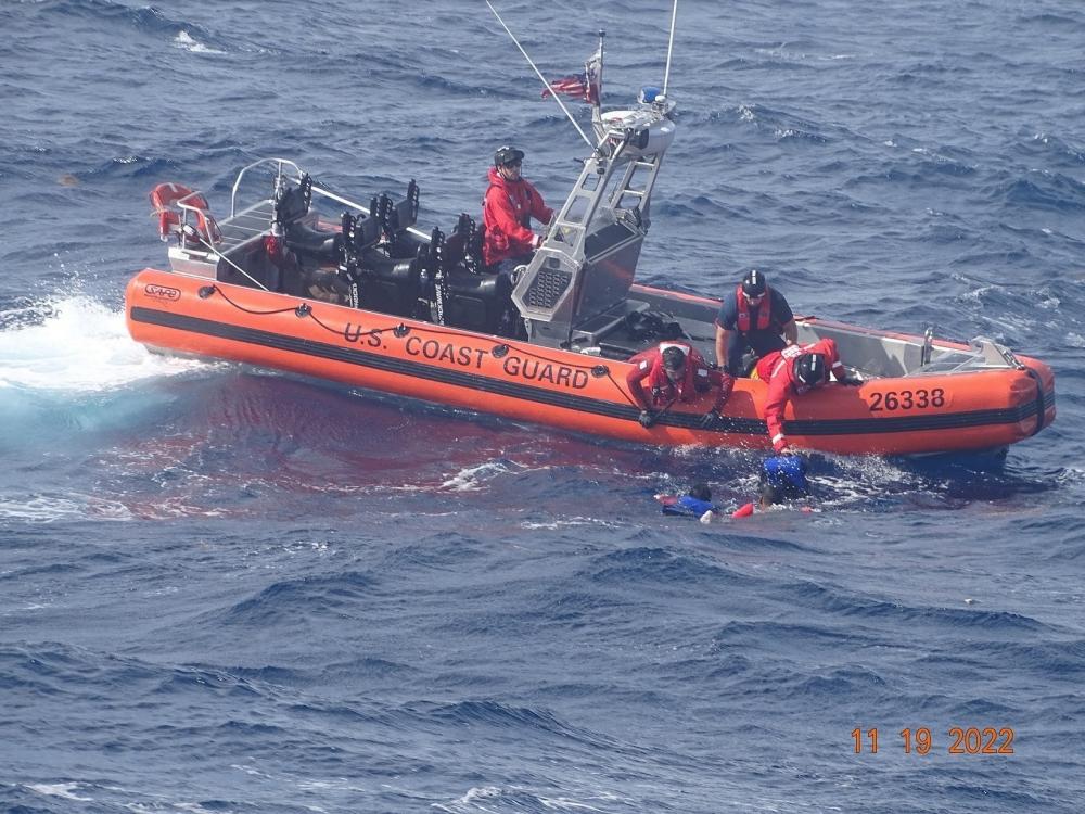 Coast Guard Cutter Pablo Valent's small boat rescue crew saves people in the water 50 miles off Little Torch Key, Florida, Nov. 19, 2022. The people were wearing lifejackets, which saved their lives. (U.S. Coast Guard photo by Coast Guard Pablo Valent's crew)