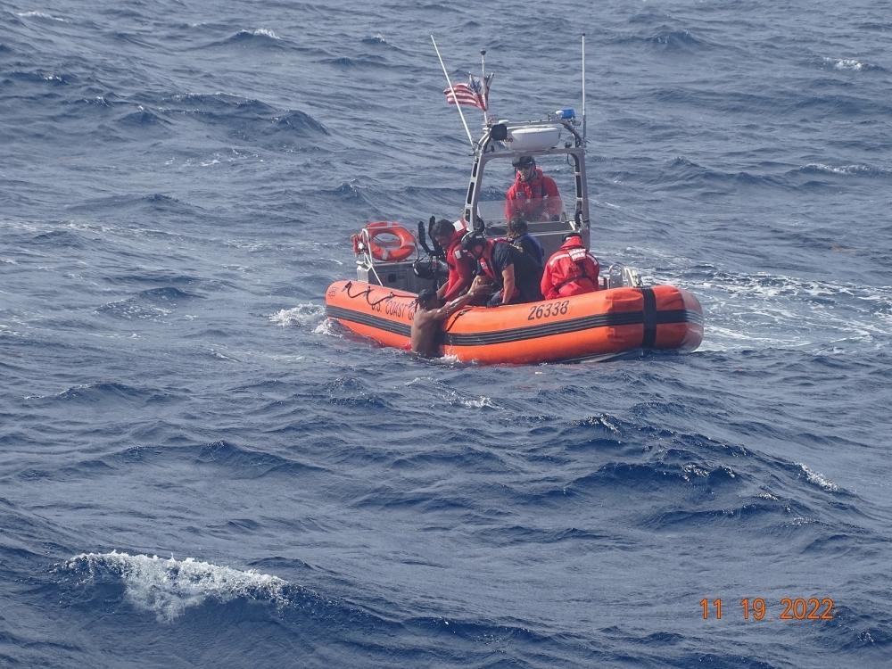 Coast Guard Cutter Pablo Valent's crew rescues a person in the water 50 miles off Little Torch Key, Florida, Nov. 19, 2022. The person reported his vessel capsizing and didn't have safety equipment. (U.S. Coast Guard photo by Cutter Pablo Valent's crew)