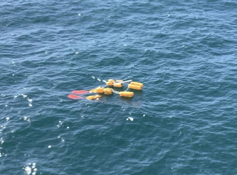 Debris from helicopter crash 10 miles off Southwest Pass, Louisiana, Dec. 29, 2022. The Coast Guard suspended its search for four passengers aboard a downed helicopter. (U.S. Cost Guard photo)