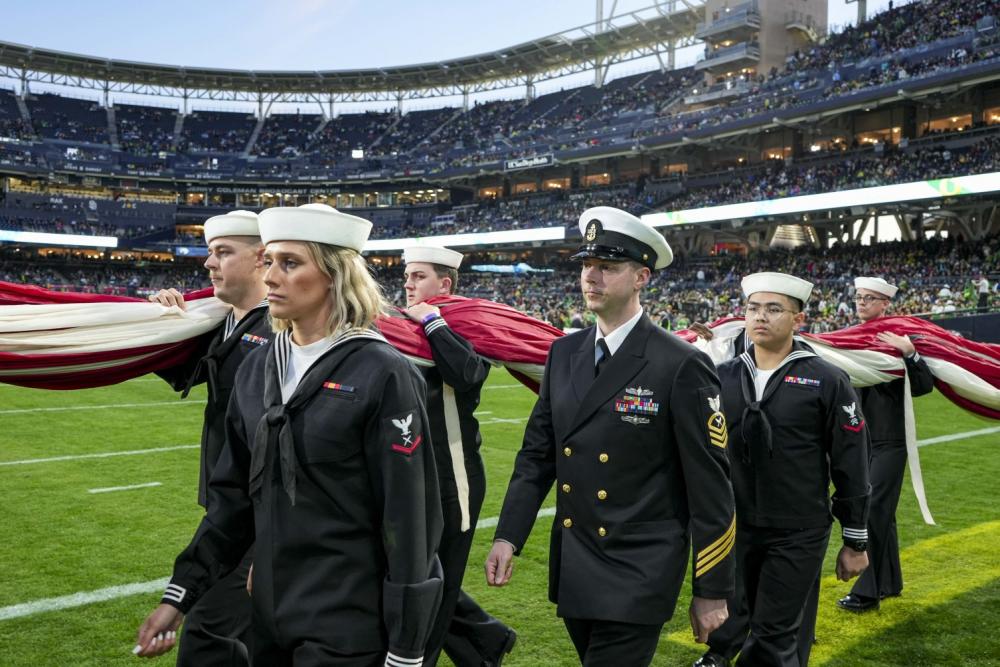 USS Essex Sailors participate in the 2022 Holiday Bowl Pregame Show