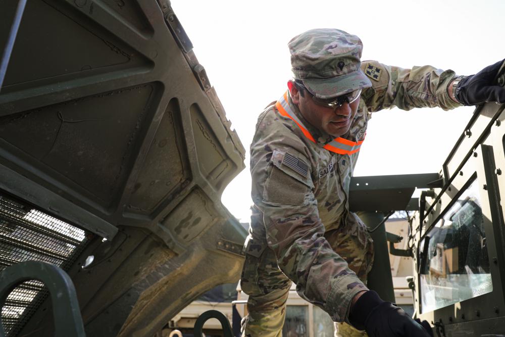 Soldiers Conduct Preventive Maintenance Checks and Services at Joint Readiness Training Center