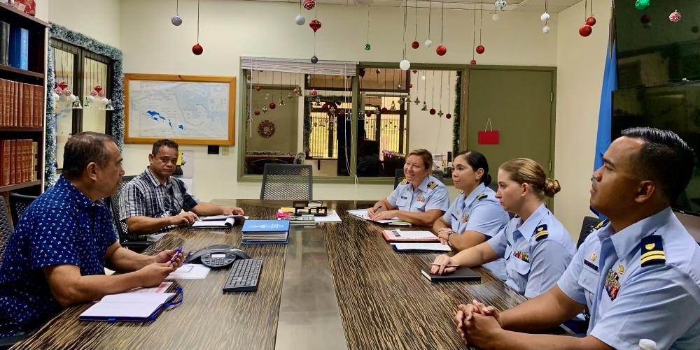U.S. Coast Guard members meet with the Federated States of Micronesia Assistant Attorney General Mr. Jeffrey Tilfas and FSM Maritime Wing Commander Steward Peter to reaffirm mutual partnership during a visit in Pohnpei, FSM, Dec. 12-15, 2022. 