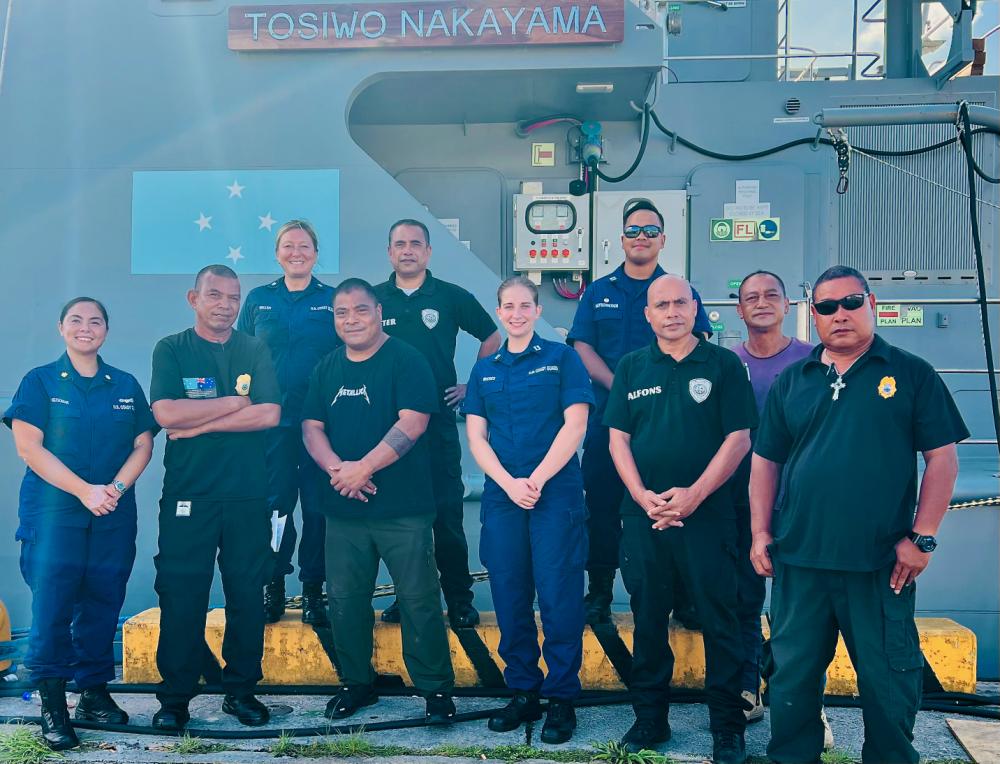 U.S. Coast Guard members take a moment for a photo with Federated States of Micronesia National Police shipriders in front of FSM’s Guardian-class patrol boat, the FSS Tosiwo Nakayama in Pohnpei, FSM, Dec. 12-15, 2022.