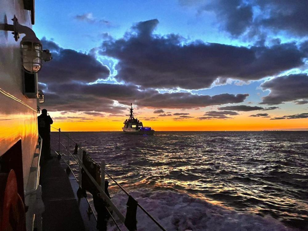 Coast Guard Cutter Manowar conducts routine operations with Coast Guard James in the Florida Straits, Jan. 17, 2023. The James is a National Security Cutter with advanced capabilities enabling its crew to enhance Coast Guard efforts to stop illegal migration at sea. (Coast Guard photo by Senior Chief Petty Officer Brodie MacDonald)